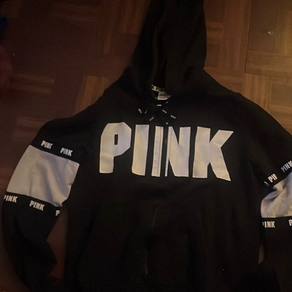 Pink Victoria’s Secret black-and-white hoodie